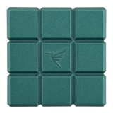 a square green tile with a bird design